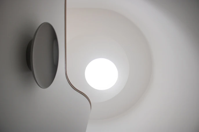 A circular skylight over staircase at YUN Architecture's Fort Greene townhouse design.