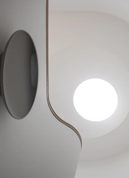 A circular skylight over staircase at YUN Architecture's Fort Greene townhouse design.