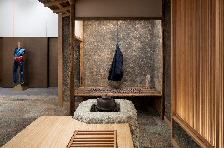 Detail view of tokonoma niche (used here for exhibiting an indigo jacket) and tea-warming hearth at 45R's new clothing store in Soho, New York.