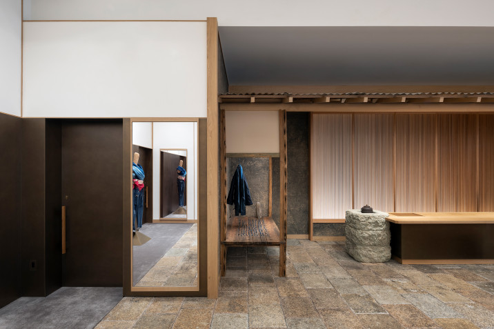 View of 45R's new clothing store in Soho, New York, with changing rooms, tokonoma niche for clothing display and tea-warming hearth.